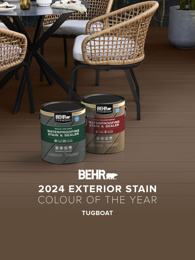 Mobile-sized image of a wooden deck stained in Tugboat, featuring Behr 2024 Colour of the Year, Tugboat
