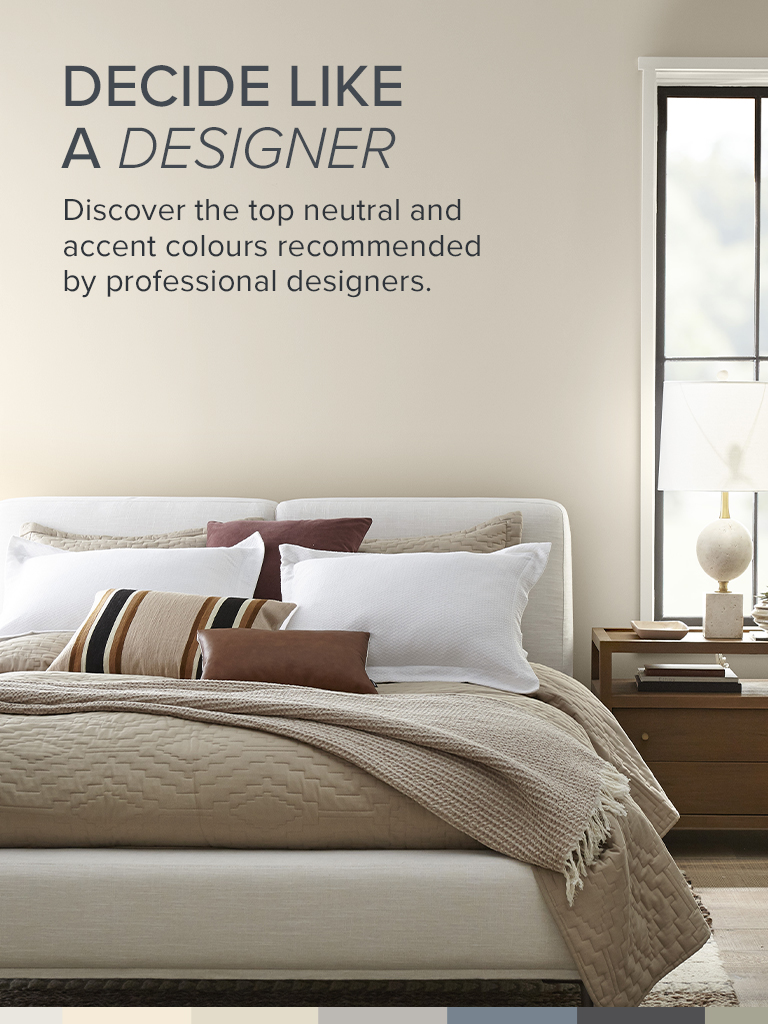 Mobile-sized image of a painted bedroom and the words BEHR® Designer Collection Decide Like a Designer in foreground.