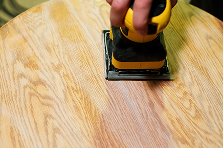 electric sander on table top