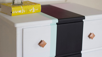 top of refinished chest of drawers with decor