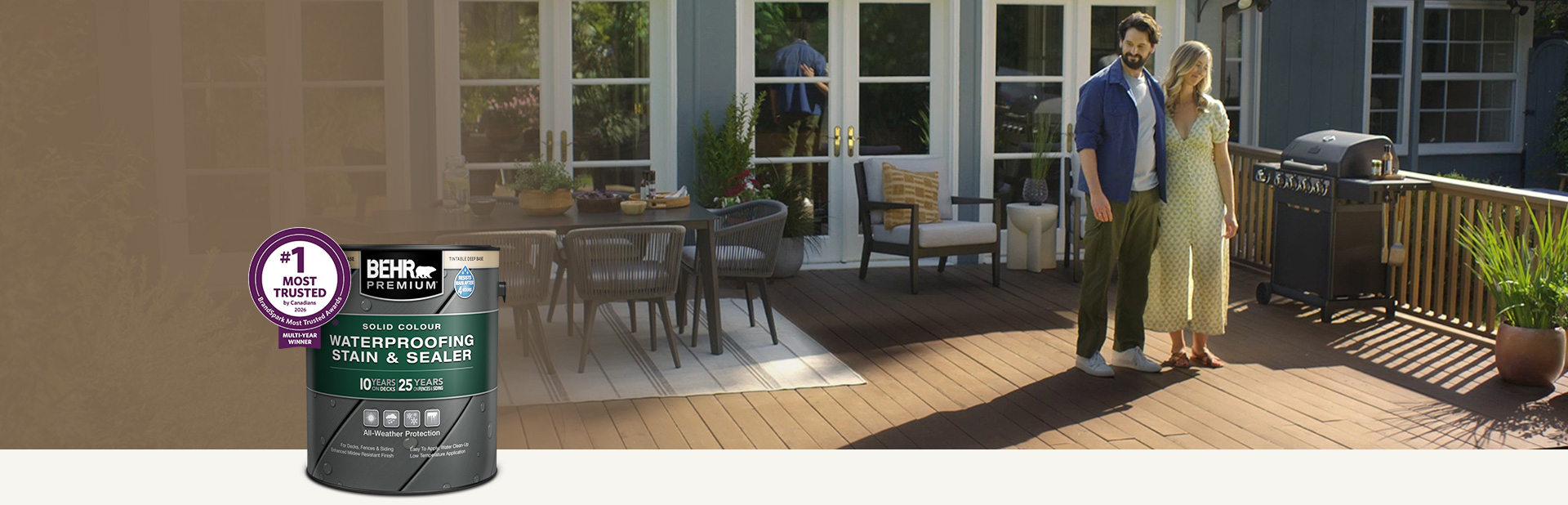 One can of Behr Premium Semi-Transparent wood stain with a wooden deck in the background