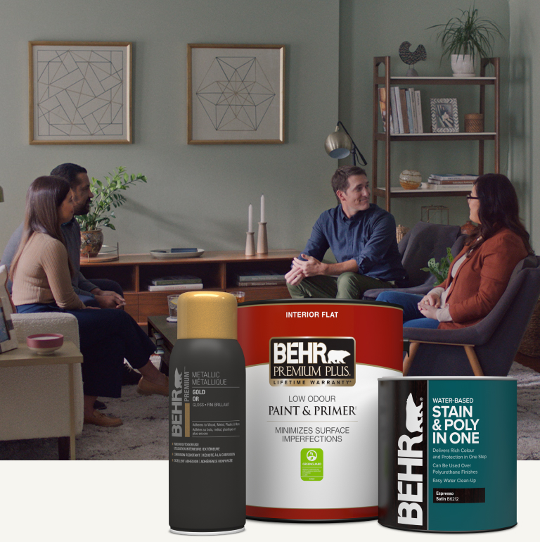 Mobile version of two couples sitting in a painted living room with a cluster of Behr paint, spray paint, and interior stain
