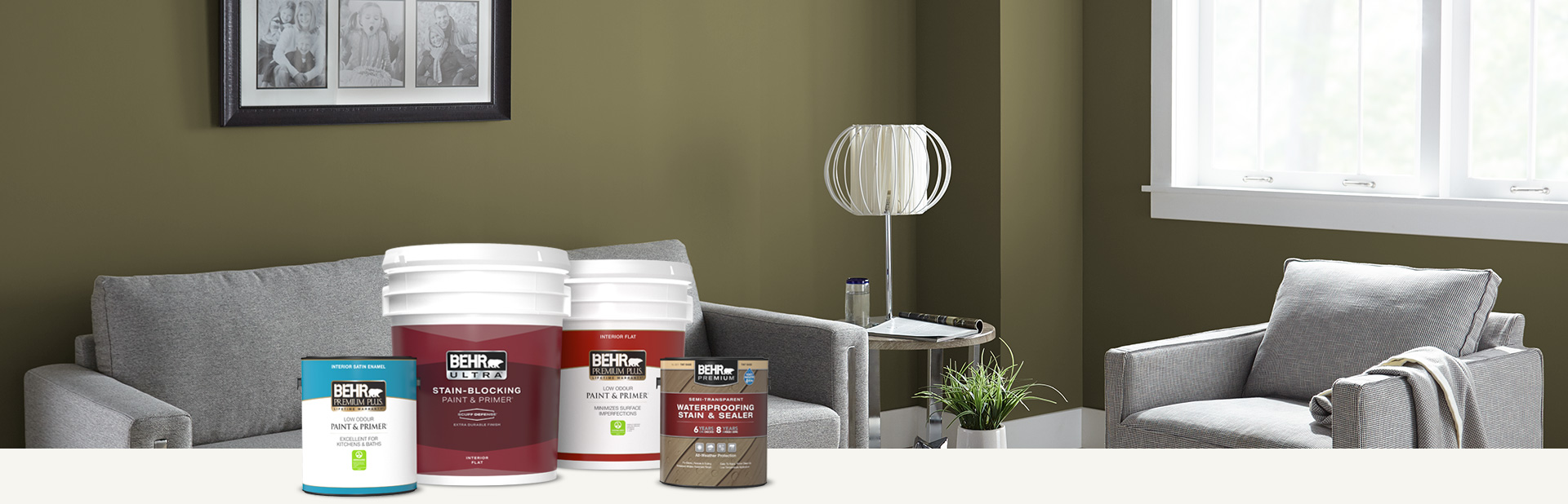 Painted living room with Behr products in the foreground.