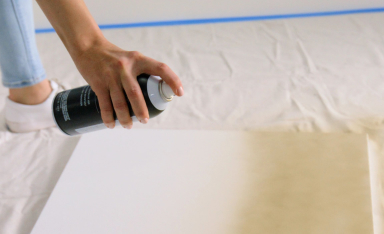 Close up of Behr Premium Spray Paint's comfortable spray actuator