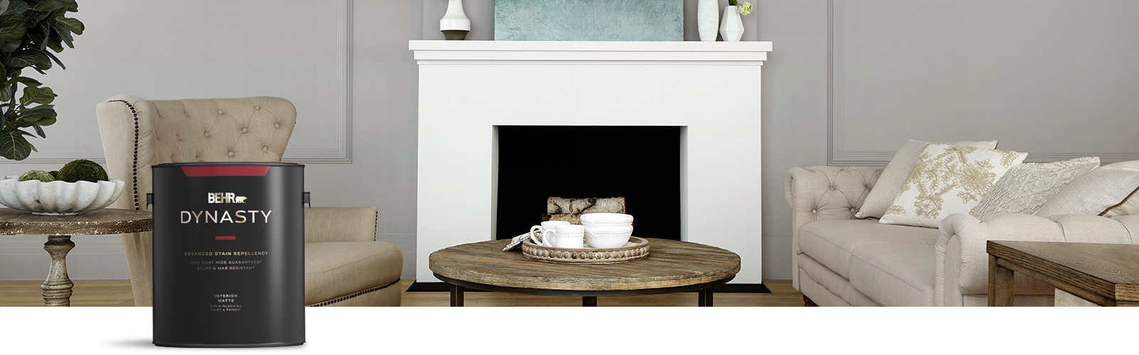 gray living room image with Behr Dynasty Interior paint can in the foreground