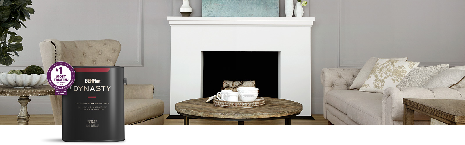 gray living room image with Behr Dynasty Interior paint can in the foreground