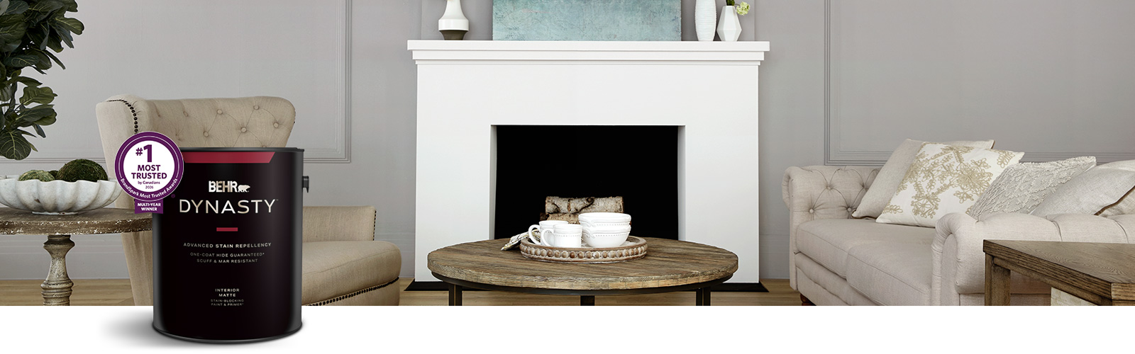 gray living room image with Behr Dynasty Interior paint can in the foreground
