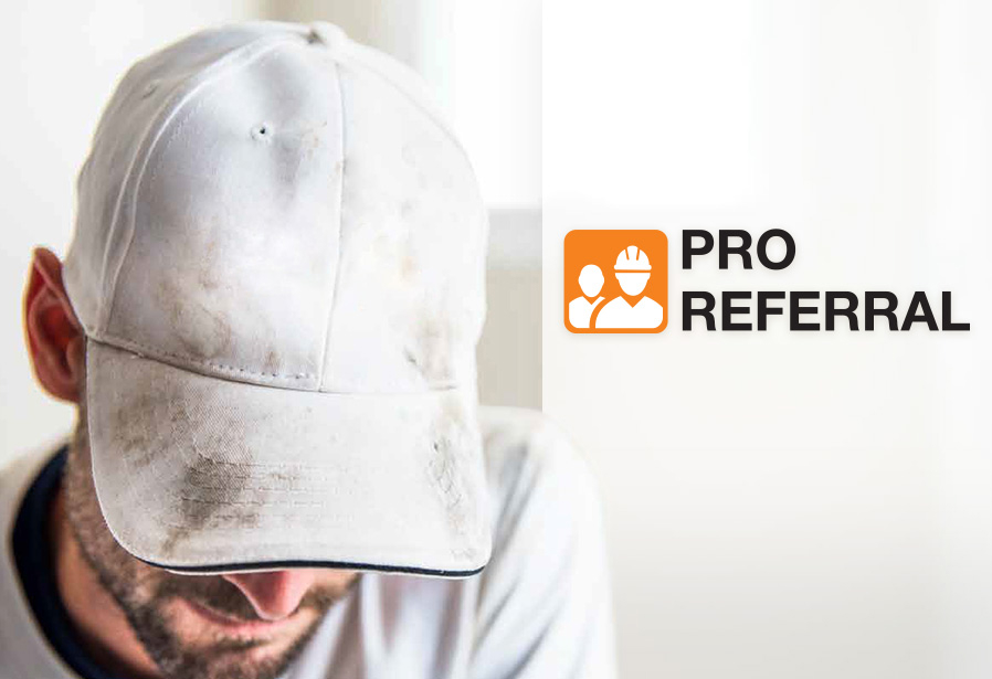 close up image of a painting contractor with the Pro Referral logo