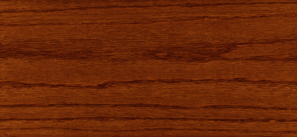 A wood stain sample in the color Antique Walnut, a red-tone medium brown.