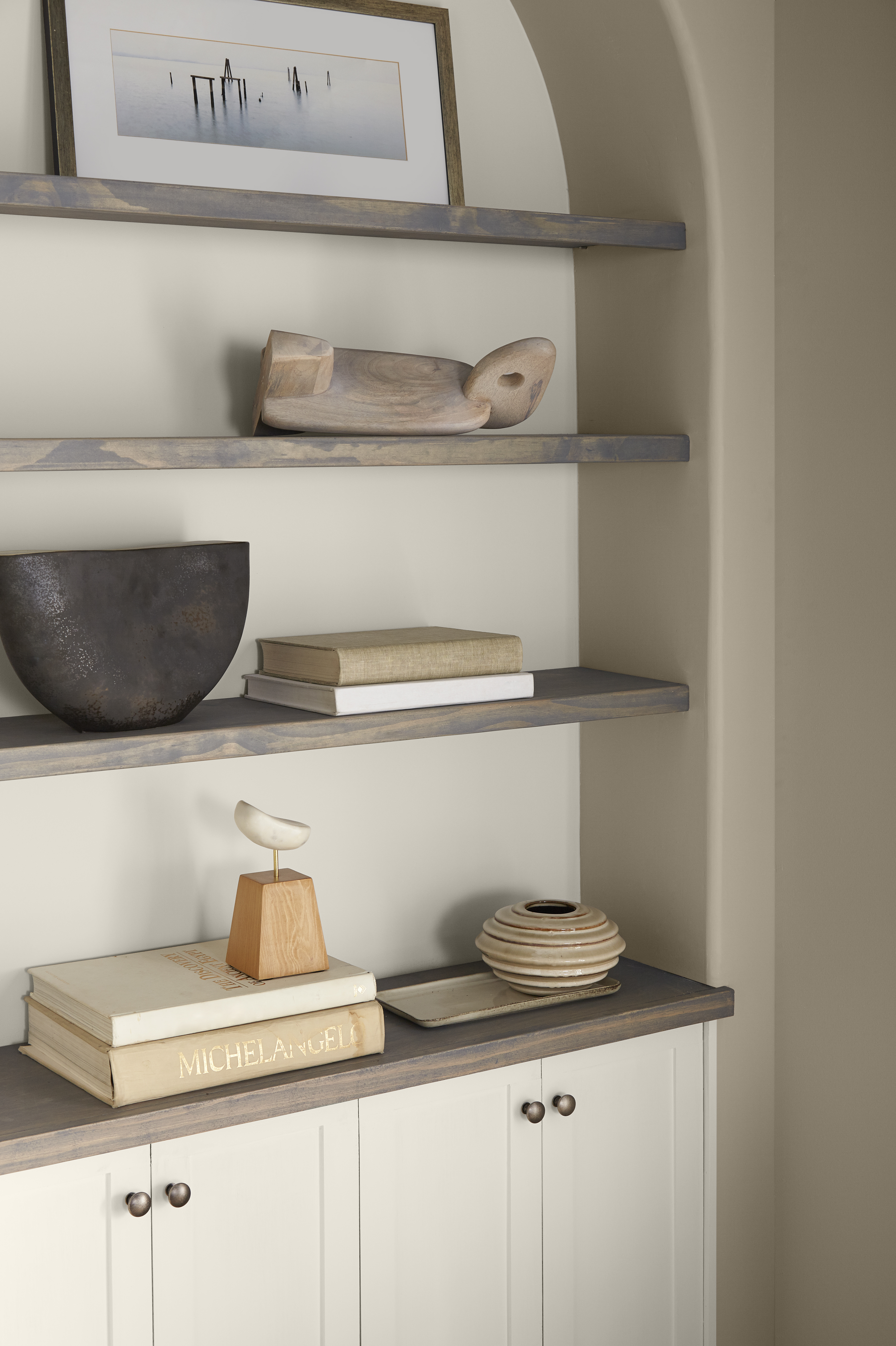 A closeup of built-in shelves painted in Even Better Beige.