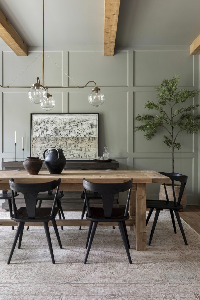 Lauren Lane's dining room painted in a warm grey with a warm green undertone.