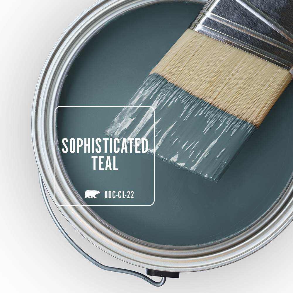 The top view of an open paint can featuring the colour Sophisticated Teal