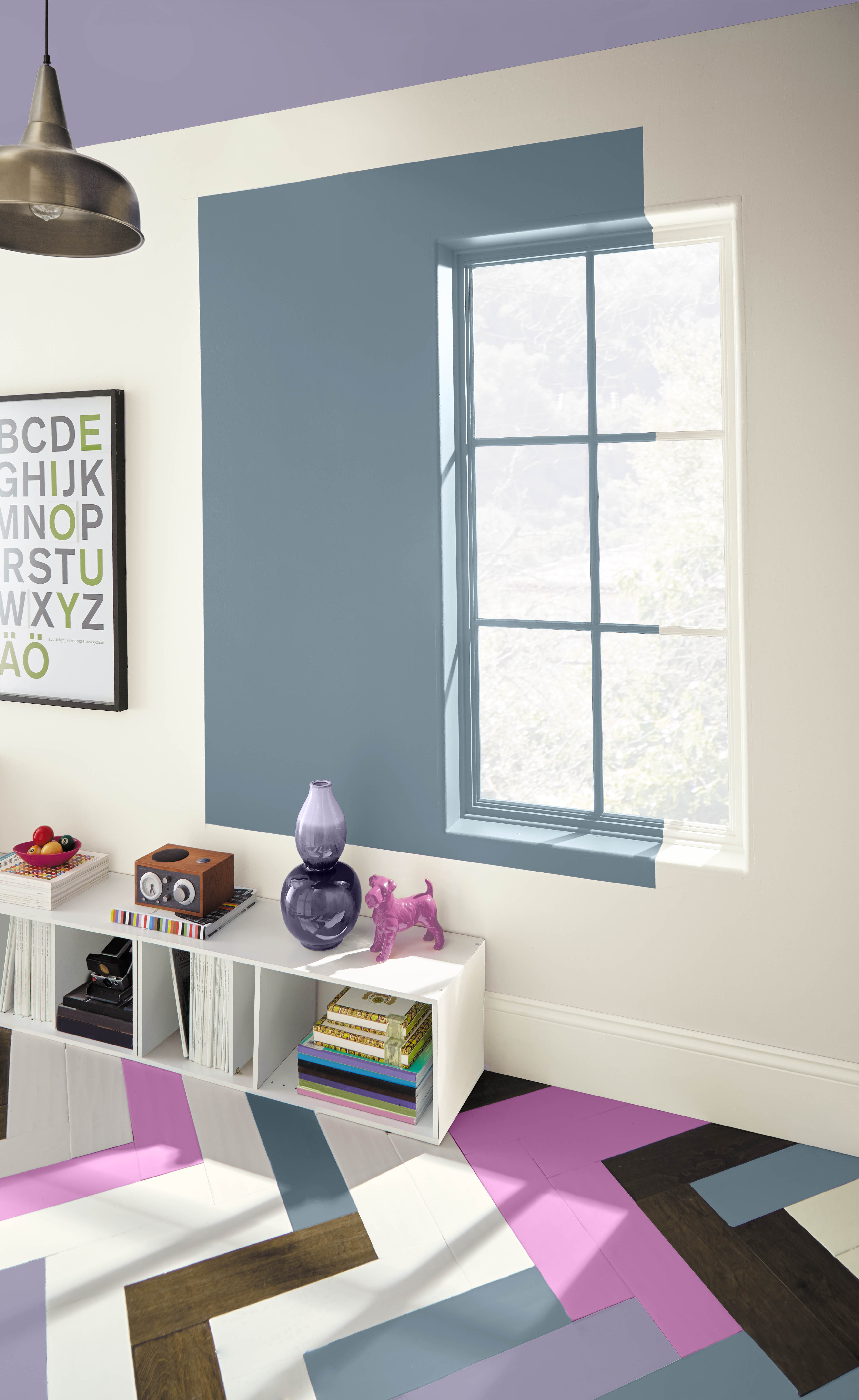 An eclectic playroom with blue, purple, and magenta accents