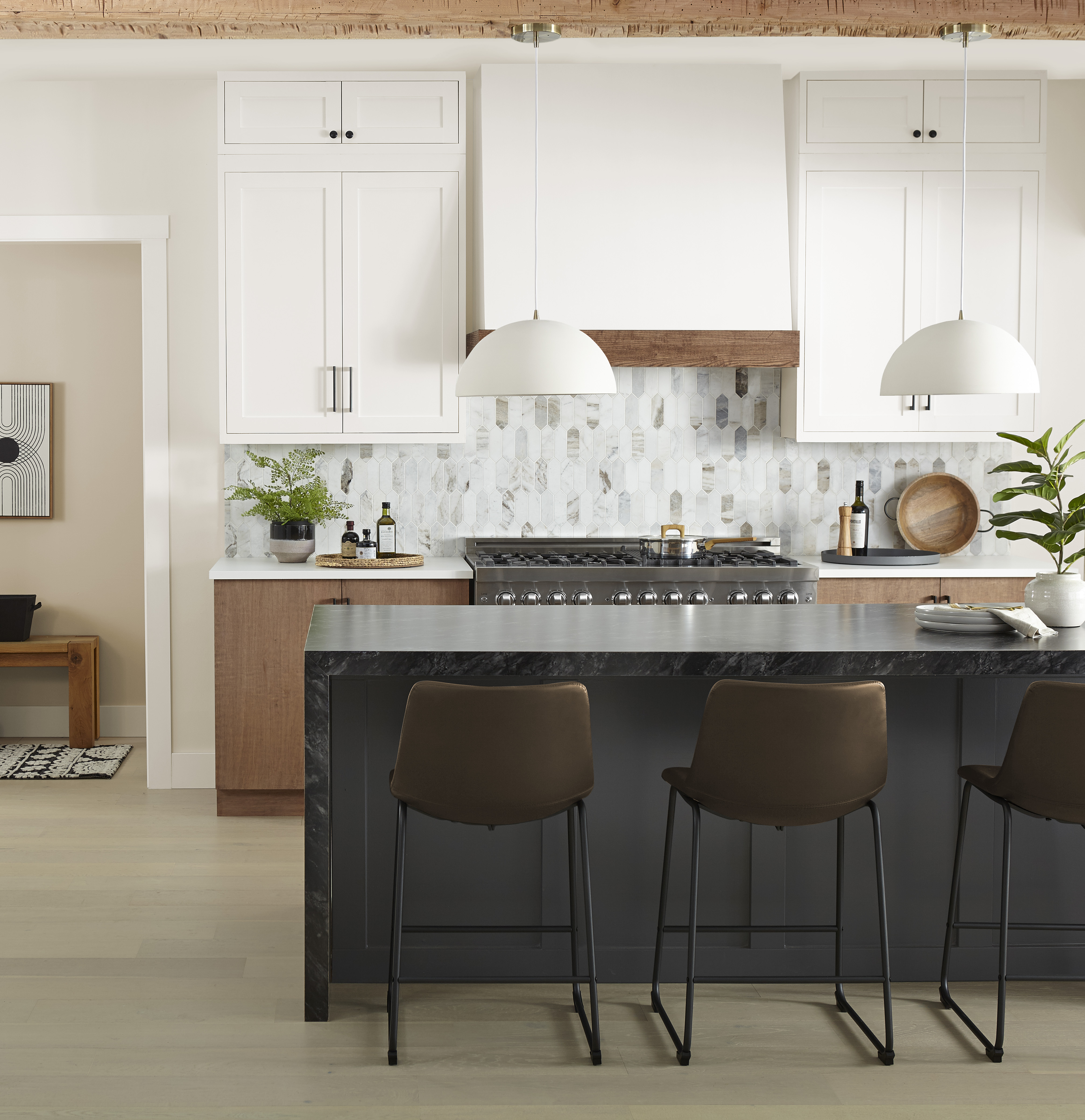 A white and wood kitchen with an accent kitchen island in the colour Cracked Pepper