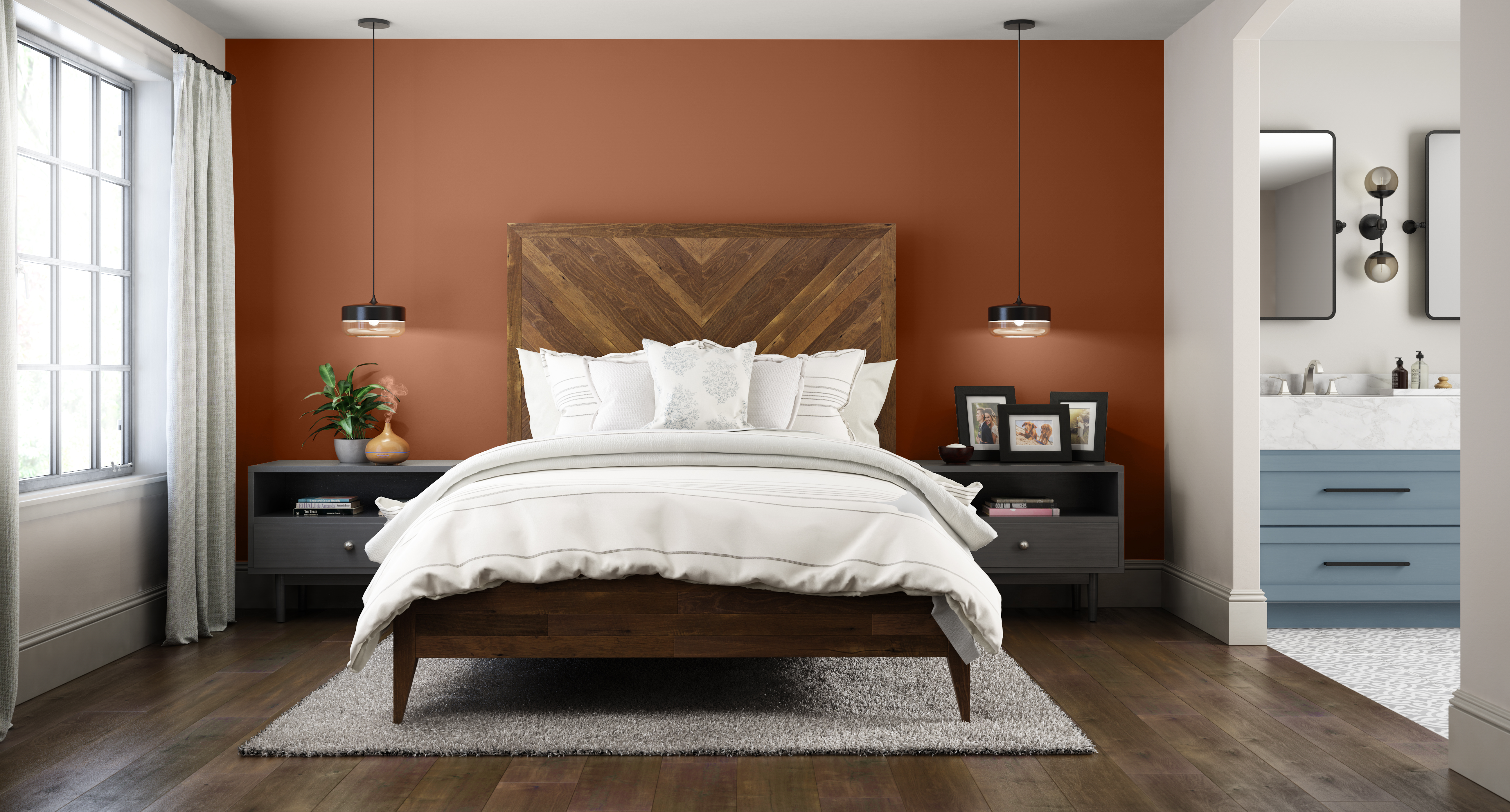 An industrial modern bedroom with an accent wall in the colour Orange Flambe