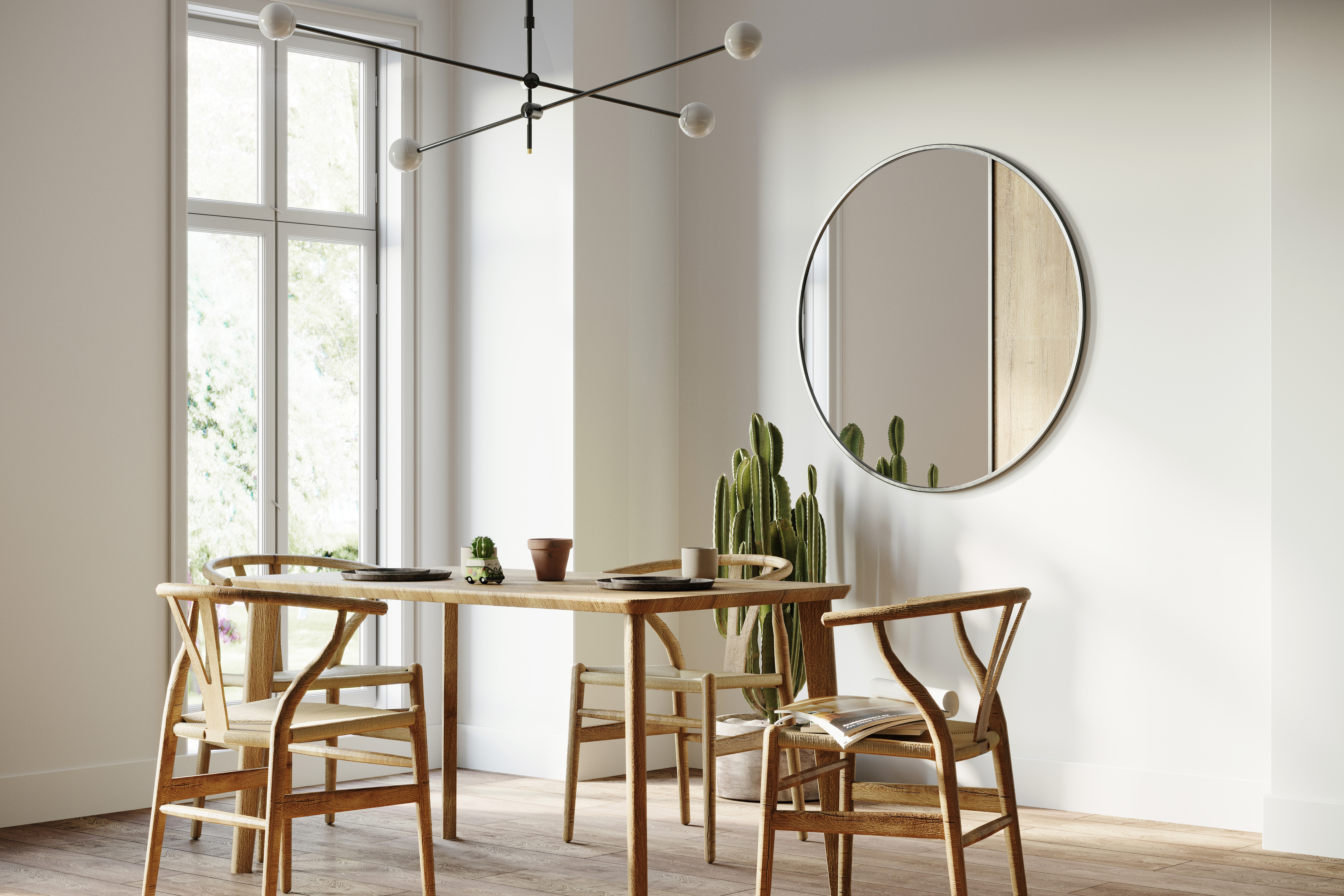 A modern dining room with walls painted in white, styled with a minimalist dining table and chairs set, a round mirror, and a simple light fixture