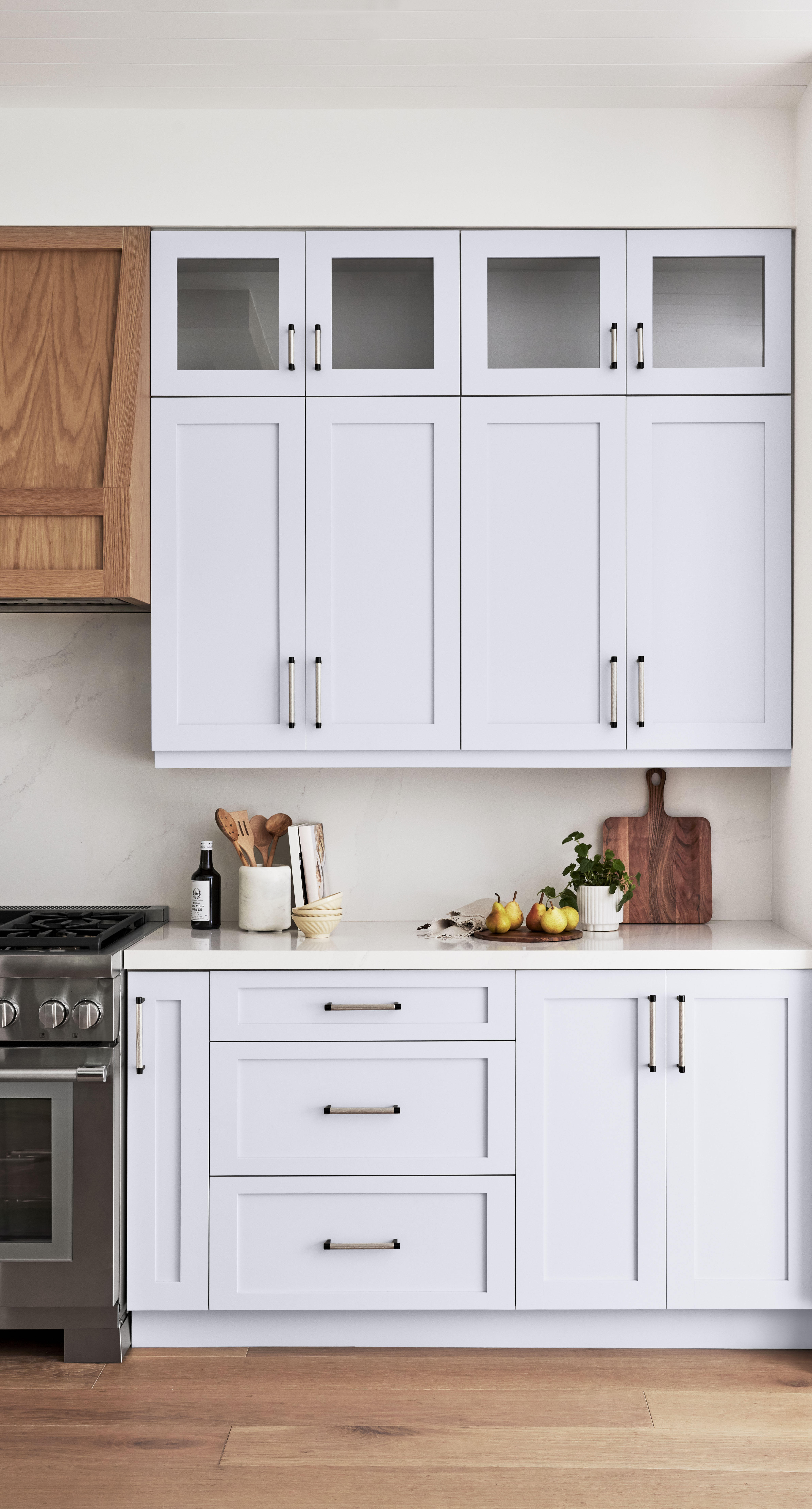 Cabinets painted in a purplish-gray hue