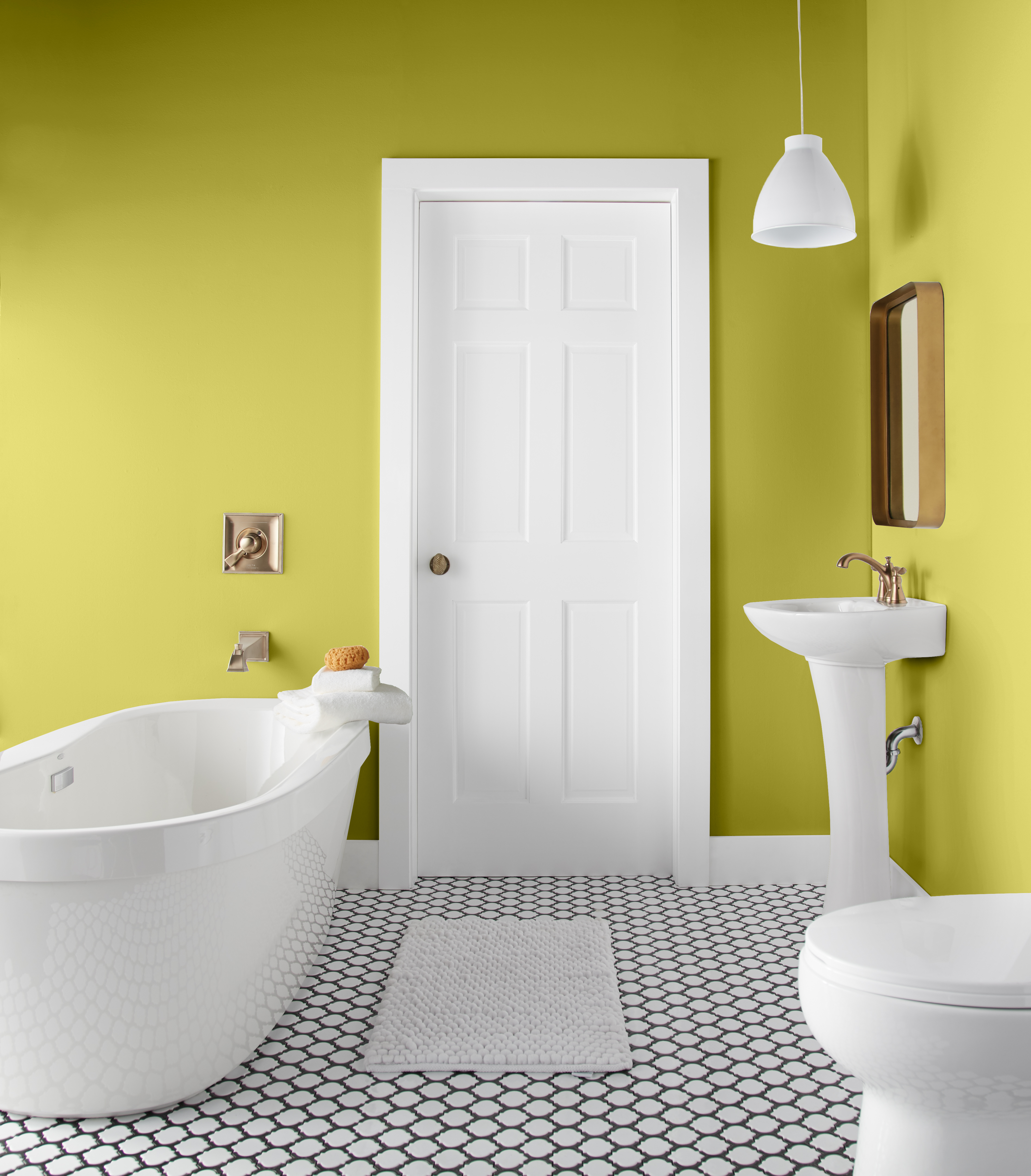 A bathroom painted in a lime green hue.