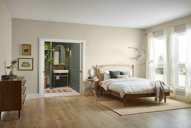 The image depicts a stylish and cozy bedroom with an adjoining bathroom, designed with a harmonious blend of natural and elegant elements.