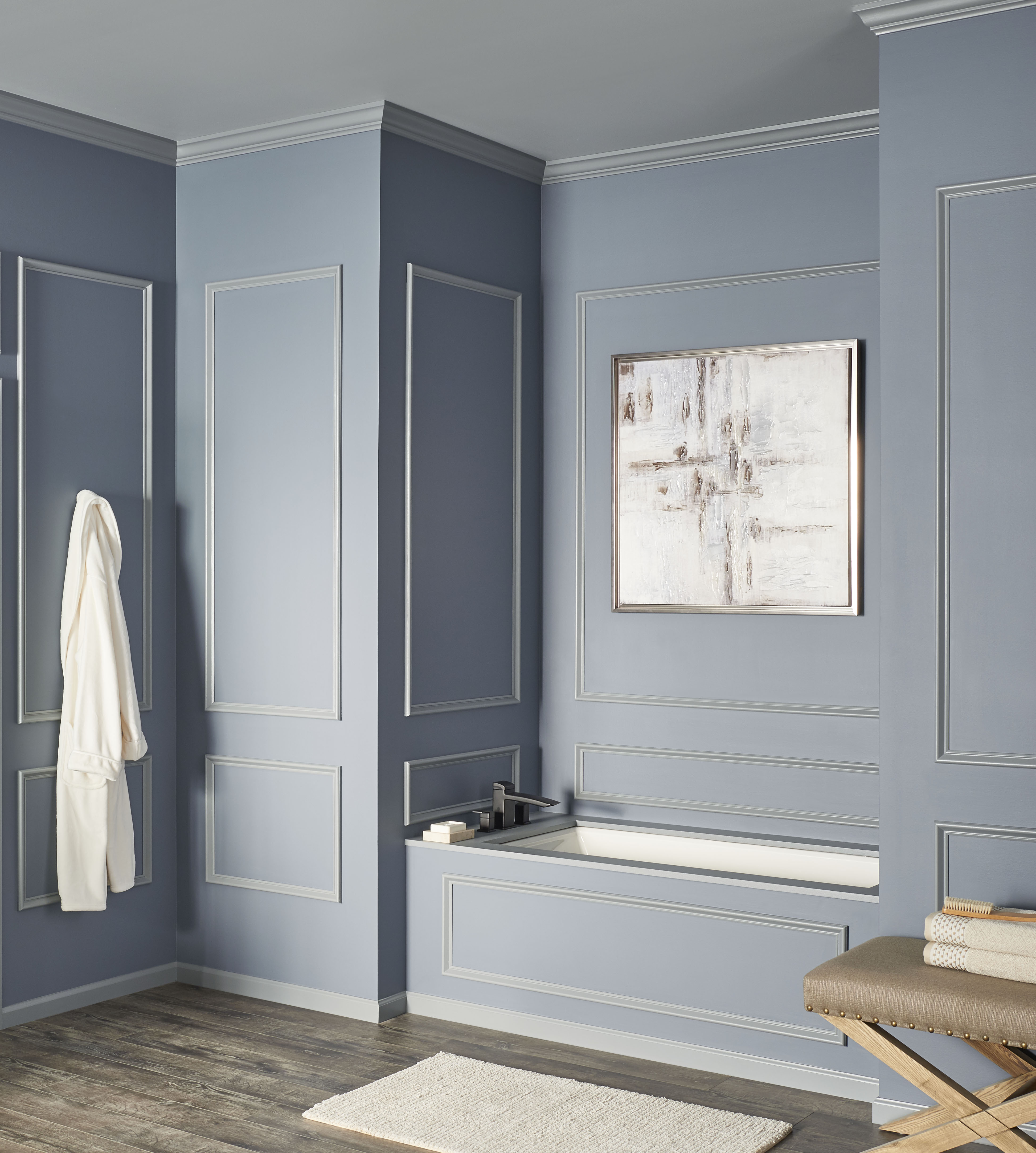 A bathroom with walls painted in greyed-blue colour.