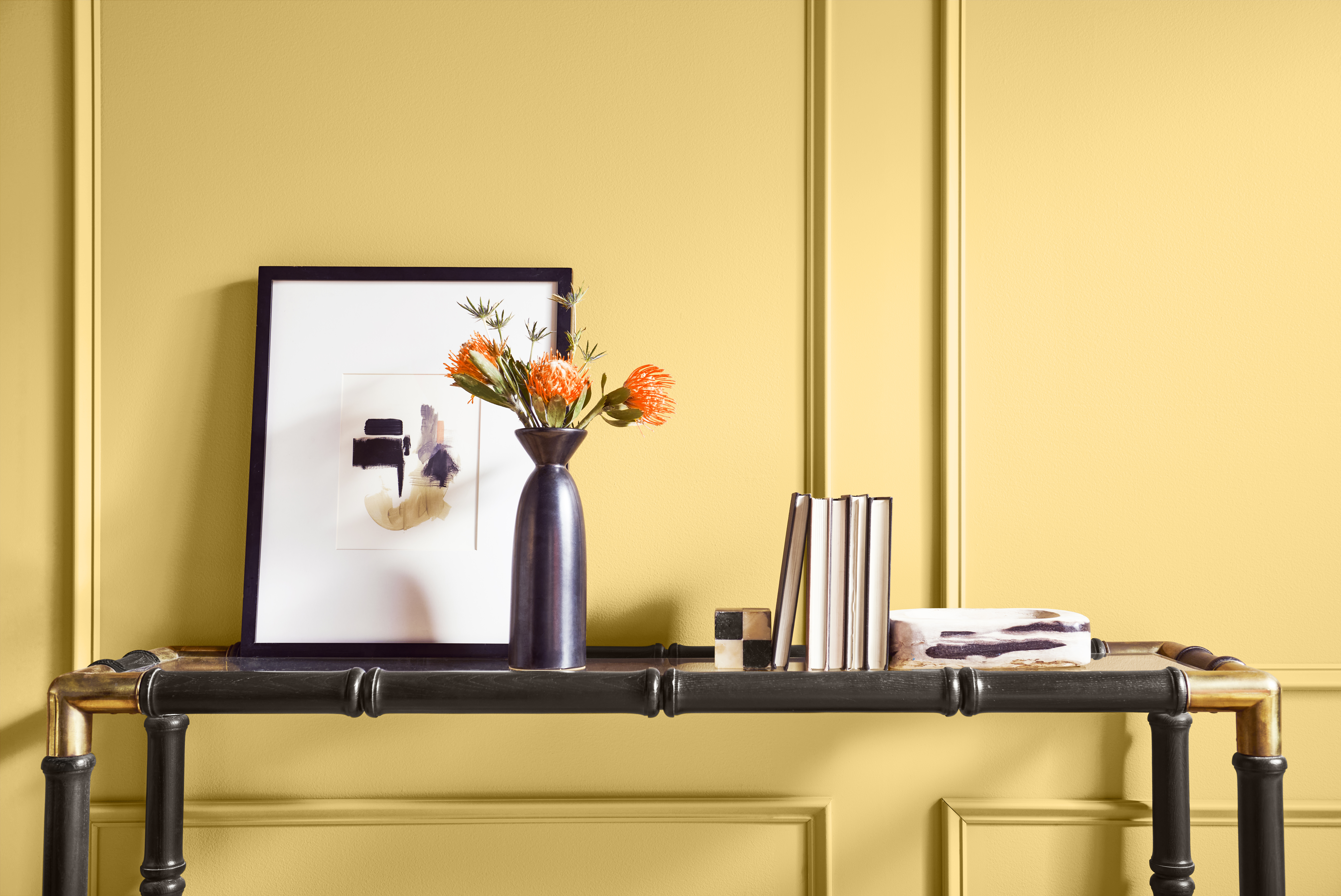 A bright hallway with the wall in a sunglow yellow hue.